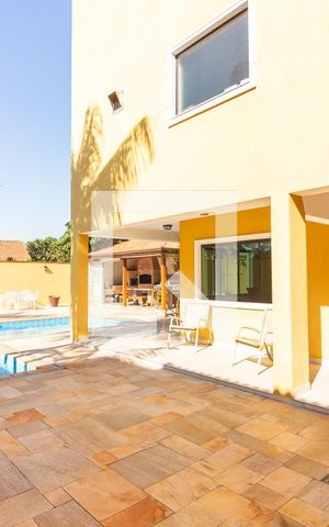 Casa de condomínio à venda com 445m², 4 quartos e 4 vagas Casa de condomínio à venda com 445m², 4 quartos e 4 vagasÁrea Gourmet