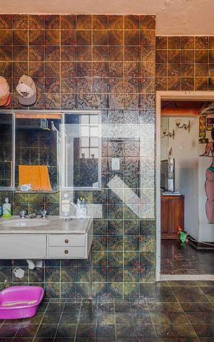 Casa à venda com 690m², 4 quartos e 5 vagasBanheiro da Suíte