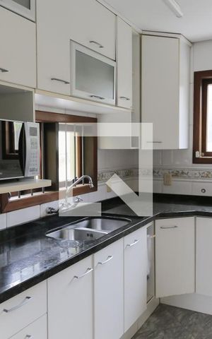 Casa à venda com 250m², 3 quartos e 3 vagas Casa à venda com 250m², 3 quartos e 3 vagasCozinha