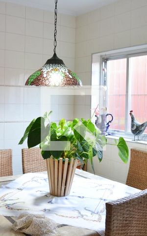 Casa à venda com 200m², 3 quartos e 2 vagas Casa à venda com 200m², 3 quartos e 2 vagasCozinha