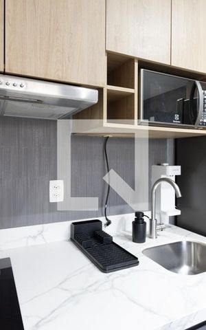 Studio para alugar com 32m², 1 quarto e 1 vaga Studio para alugar com 32m², 1 quarto e 1 vagaCozinha