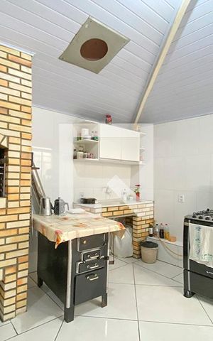 Casa para alugar com 125m², 2 quartos e 2 vagasCozinha
