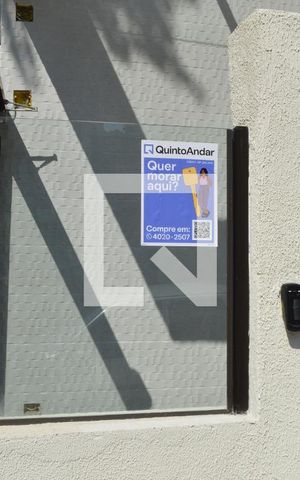 Apartamento à venda com 75m², 3 quartos e 2 vagasFachada + Plaquinha