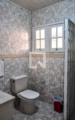 Casa à venda com 125m², 4 quartos e 2 vagas Casa à venda com 125m², 4 quartos e 2 vagasBanheiro