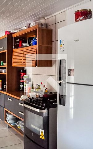 Casa à venda com 125m², 4 quartos e 2 vagas Casa à venda com 125m², 4 quartos e 2 vagasCozinha