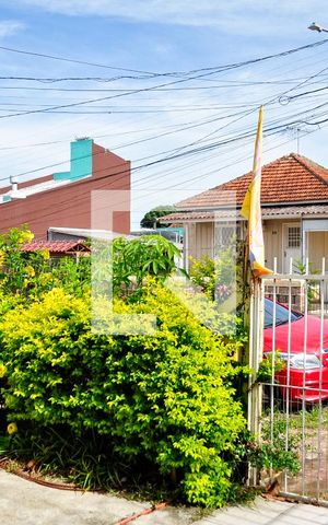 Casa à venda com 125m², 4 quartos e 2 vagas Casa à venda com 125m², 4 quartos e 2 vagasFachada