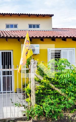 Casa à venda com 125m², 4 quartos e 2 vagas Casa à venda com 125m², 4 quartos e 2 vagasFachada