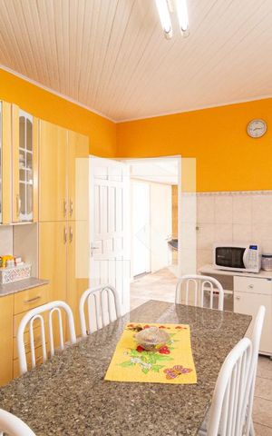 Casa à venda com 340m², 6 quartos e 2 vagasCasa 1Cozinha
