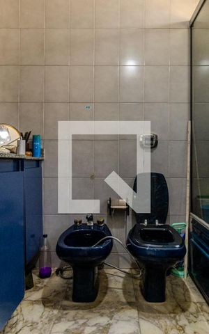Casa à venda com 477m², 3 quartos e 4 vagasBanheiro da Suíte 1