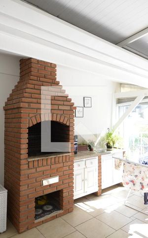Casa de condomínio à venda com 250m², 4 quartos e 2 vagasChurrasqueira