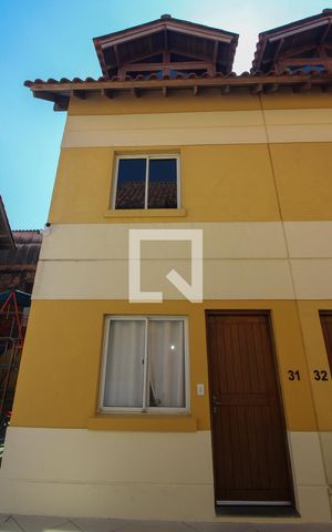 Casa de condomínio à venda com 80m², 2 quartos e 2 vagasFachada