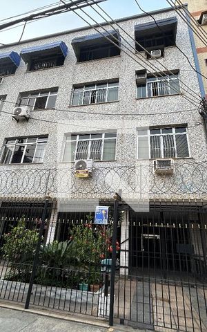 Apartamento à venda com 70m², 2 quartos e 1 vagaFachada + Plaquinha