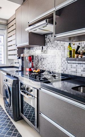 Apartamento à venda com 57m², 2 quartos e 1 vagaCozinha e Área de Serviço
