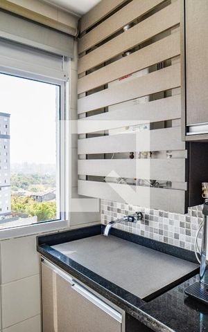 Apartamento à venda com 57m², 2 quartos e 1 vagaCozinha e Área de Serviço