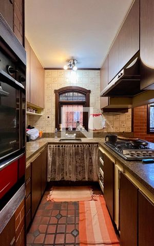 Casa à venda com 592m², 5 quartos e 3 vagas Casa à venda com 592m², 5 quartos e 3 vagasCozinha