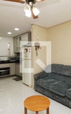 Casa de condomínio à venda com 102m², 3 quartos e 2 vagasSala