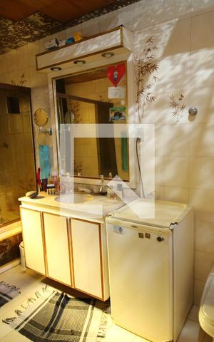 Casa à venda com 420m², 3 quartos e 2 vagasBanheiro da Suíte 3