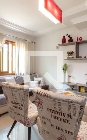 Casa de condomínio à venda com 127m², 3 quartos e 2 vagasSala de Estar