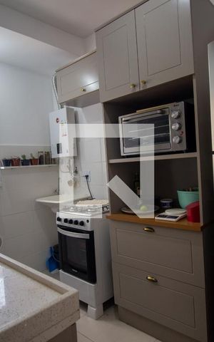 Apartamento à venda com 45m², 2 quartos e 1 vaga Apartamento à venda com 45m², 2 quartos e 1 vagaCozinha e Área de Serviço
