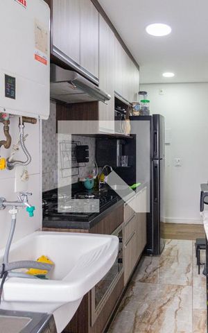 Apartamento à venda com 88m², 2 quartos e 1 vagaCozinha e área de serviço