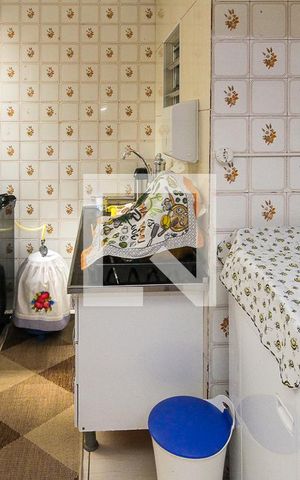 Casa à venda com 225m², 4 quartos e 2 vagas Casa à venda com 225m², 4 quartos e 2 vagasCozinha e Área de Serviço cassa 03