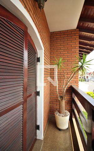 Casa à venda com 297m², 4 quartos e 5 vagasQuarto 1 - Suíte Sacada