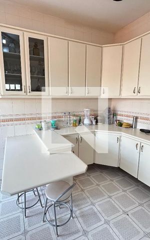 Casa à venda com 250m², 3 quartos e 4 vagas Casa à venda com 250m², 3 quartos e 4 vagasCozinha