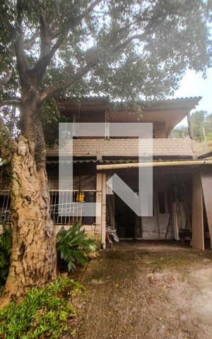 Casa à venda com 65m², 2 quartos e 1 vaga Casa à venda com 65m², 2 quartos e 1 vagaFachada
