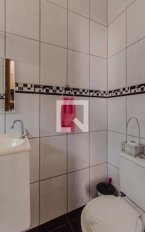 Casa de condomínio à venda com 254m², 6 quartos e 2 vagas Casa de condomínio à venda com 254m², 6 quartos e 2 vagasBanheiro da Suíte 2 Casa 1