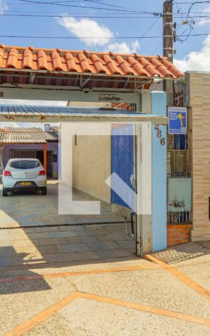 Casa à venda com 65m², 2 quartos e 3 vagas Casa à venda com 65m², 2 quartos e 3 vagasFachada