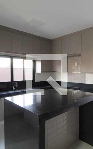 Casa de condomínio para alugar com 232m², 4 quartos e 4 vagasCozinha