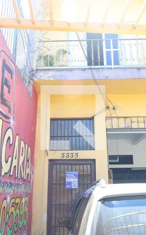 Casa à venda com 350m², 3 quartos e 3 vagasPortão do imóvel - Placa instalada no portão do imóvel
