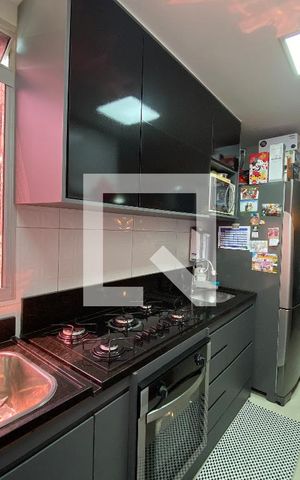 Apartamento à venda com 48m², 2 quartos e 1 vaga Apartamento à venda com 48m², 2 quartos e 1 vagaCozinha e Área de Serviço