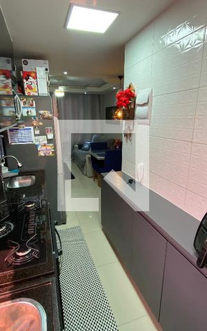 Apartamento à venda com 48m², 2 quartos e 1 vaga Apartamento à venda com 48m², 2 quartos e 1 vagaCozinha e Área de Serviço