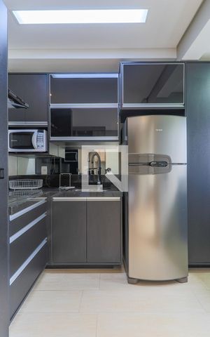 Studio à venda com 33m², 1 quarto e 1 vagaCozinha Studio