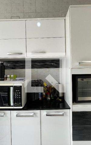 Apartamento para alugar com 55m², 2 quartos e 2 vagas Apartamento para alugar com 55m², 2 quartos e 2 vagasCozinha