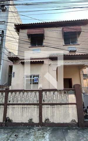 Casa para alugar com 70m², 2 quartos e sem vagaFachada + plaquinha