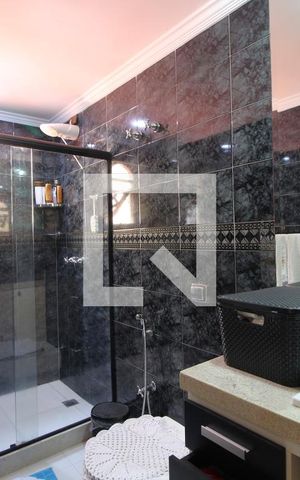 Casa de condomínio à venda com 350m², 4 quartos e 3 vagasQuarto 3 - Banheiro da Suíte