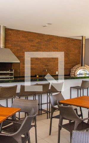 Apartamento à venda com 56m², 2 quartos e 1 vaga Apartamento à venda com 56m², 2 quartos e 1 vagaÁREA COMUM - CHURRASQUEIRA