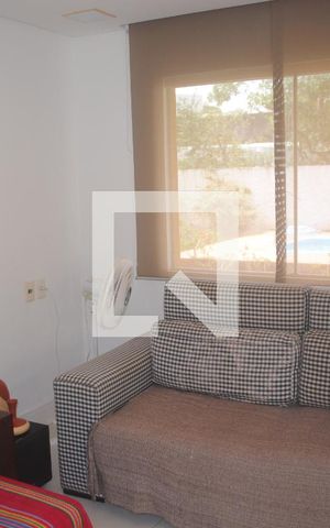 Casa de condomínio para alugar com 420m², 5 quartos e 3 vagasSala de TV