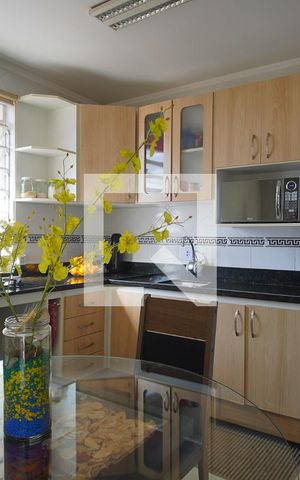 Casa à venda com 124m², 3 quartos e 3 vagas Casa à venda com 124m², 3 quartos e 3 vagasCozinha