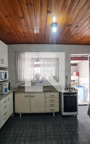 Casa à venda com 150m², 4 quartos e 1 vaga Casa à venda com 150m², 4 quartos e 1 vagaCozinha