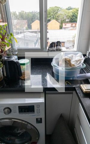 Apartamento à venda com 56m², 2 quartos e 1 vaga Apartamento à venda com 56m², 2 quartos e 1 vagaCozinha e Área de Serviço