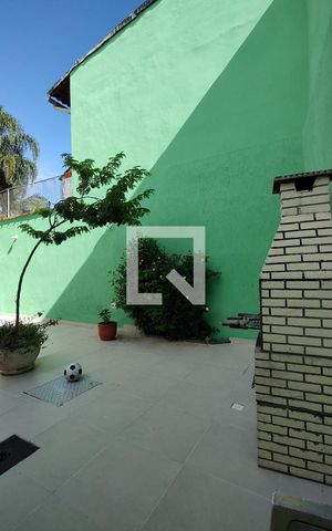 Casa de condomínio à venda com 290m², 4 quartos e 2 vagasQuintal