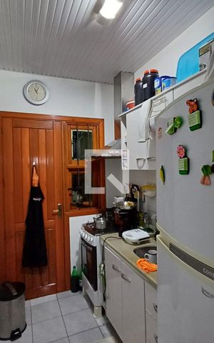 Casa à venda com 45m², 2 quartos e 1 vaga Casa à venda com 45m², 2 quartos e 1 vagaCozinha