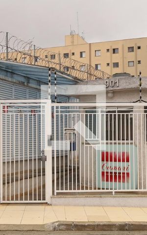 Apartamento à venda com 58m², 2 quartos e 1 vagaFachada - Placa instalada no muro do condomínio