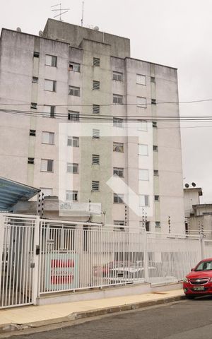 Apartamento à venda com 58m², 2 quartos e 1 vagaFachada - Placa instalada no muro do condomínio