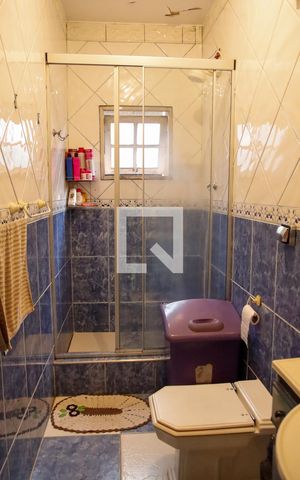 Casa à venda com 125m², 4 quartos e 2 vagas Casa à venda com 125m², 4 quartos e 2 vagasBanheiro