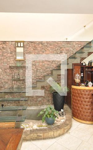 Casa à venda com 454m², 4 quartos e 2 vagasSala
