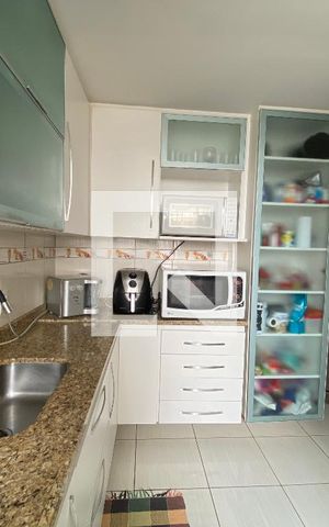 Apartamento à venda com 84m², 3 quartos e 1 vaga Apartamento à venda com 84m², 3 quartos e 1 vagaCozinha e Área de Serviço